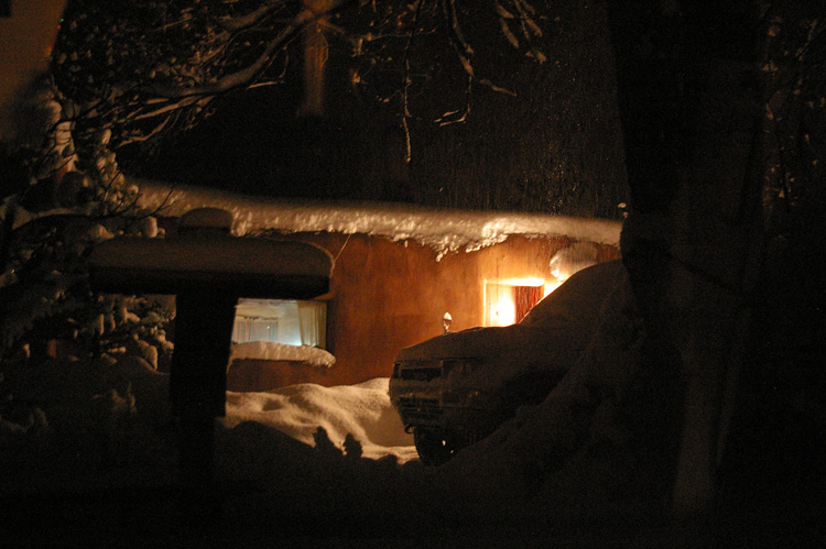 neighbors house in snow