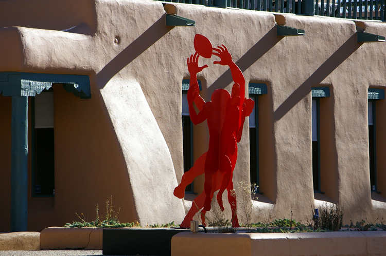Bank building and sculpture in downtown Taos