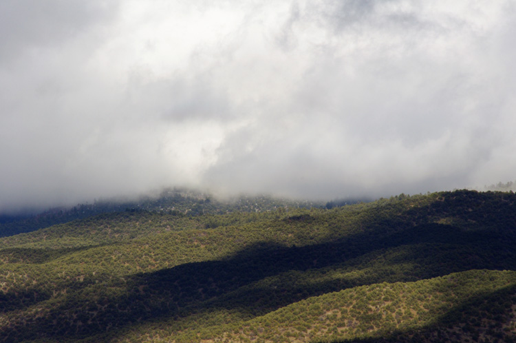 Clouds on the mountains in Taos