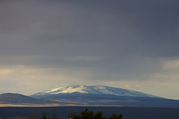 San Antonio Mountain at dusk as seen from south of Taos, New Mexico.