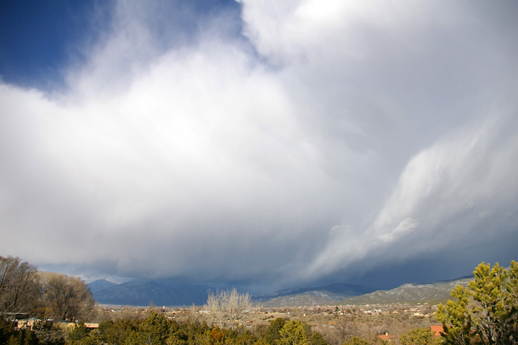 Clouds and mountains make an impressive display in Taos, NM