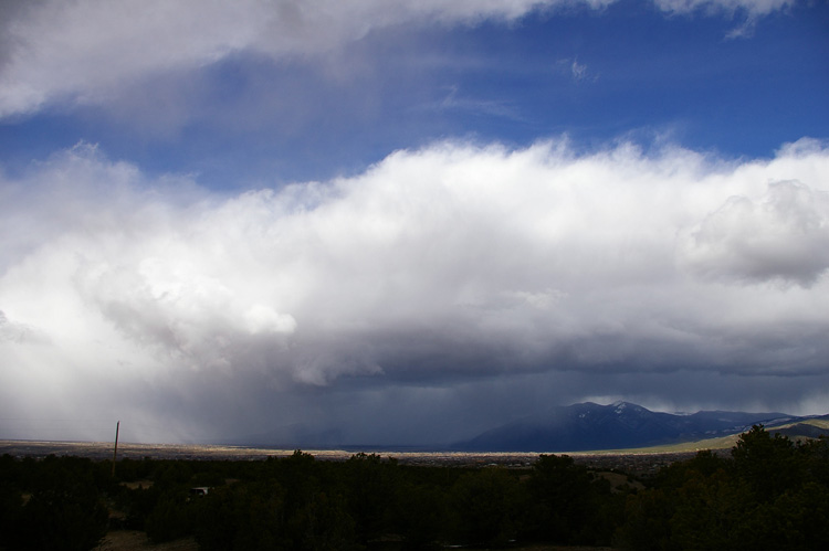 Snow heading for the Sangres in Taos, New Mexico.