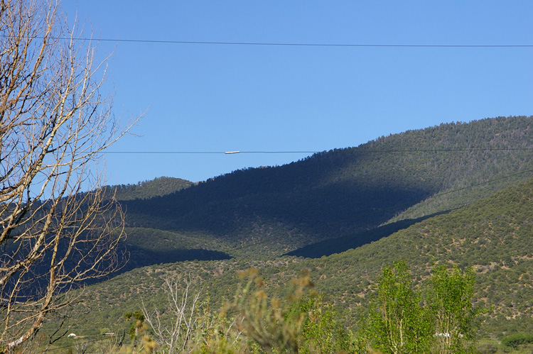 cloud shadows on hillside,  Taos, New Mexico