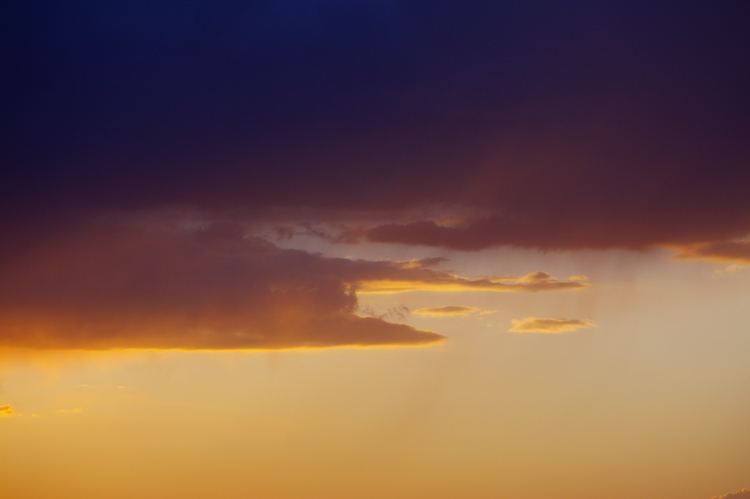 symbols in the clouds at sunset